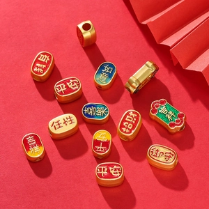 Macro detail of gold-plated lucky charms with colorful enamel for DIY jewelry making