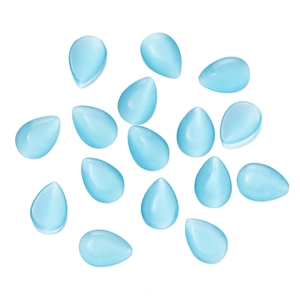 Macro shot of teardrop light blue cat eye glass cabochons for DIY jewelry making