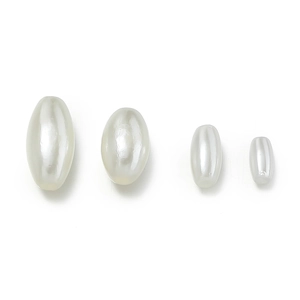 Detail showing four sizes of creamy white oval ABS pearls for DIY jewelry making
