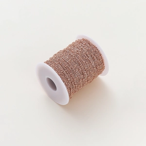 Detail of rose gold 1.8mm beaded O-chain roll for DIY jewelry making accessories