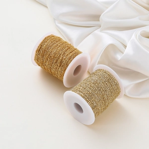 Two rolls of fine gold-plated 1.8mm bead chains on white spools for DIY jewelry making