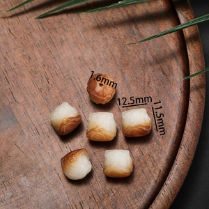 Carved Bodhi root beads for DIY jewelry with lotus patterns measuring 12.5mm by 11.5mm