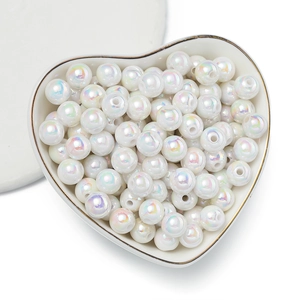 Macro di perle in acrilico bianco cangiante con finitura AB in ciotola a cuore