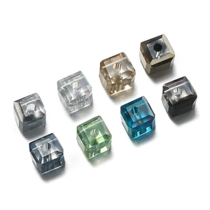 Detailed view of 6mm faceted crystal glass cubes in diverse colors for DIY jewelry making