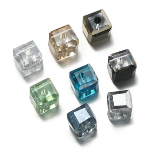 Detailed view of 6mm multi-colored faceted glass cube beads with center drill holes