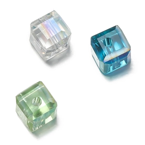 Close-up of 6mm faceted crystal glass cubes with center drill holes for DIY jewelry