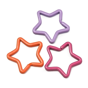 Close-up of star-shaped matte colorful lacquer keyrings for DIY accessories