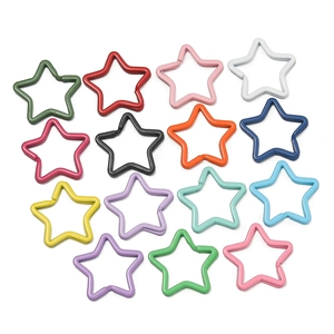 Flat lay of colorful star-shaped metal keyrings in 15 vibrant painted finishes