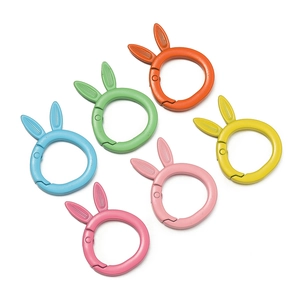 Set of six colorful rabbit-eared spring rings with a matte finish for DIY keychains