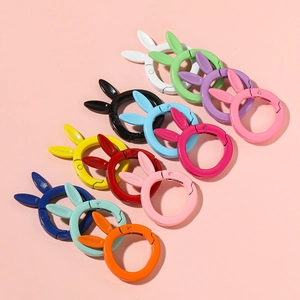 Macro shot of colorful rabbit shaped spring O-rings for DIY keychains and bags