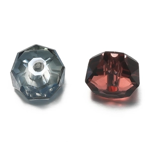 Detailed macro view of faceted glass crystal beads in blue-grey and burgundy tones