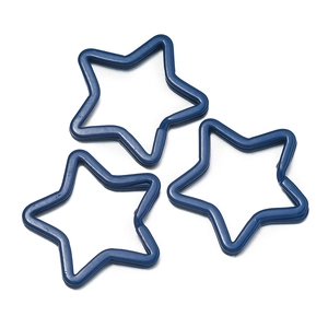 Detailed view of three navy blue star-shaped metal keychains for DIY crafts and bags