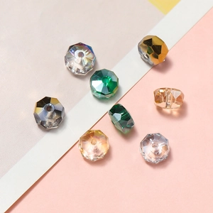 Macro shot of faceted crystal rondelle beads with holes for DIY jewelry making