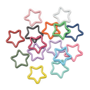 Close-up of colorful star-shaped metal split rings for DIY keychains and bag accessories