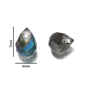 Detailed size view of faceted 6x7mm crystal teardrop beads with AB finish and dark grey