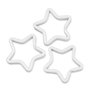 Detailed view of three matte white star-shaped metal keyrings for DIY bag accessories
