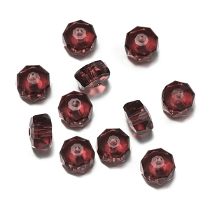 Detailed view of dark red faceted glass wheel beads with precision drill holes for DIY jewelry