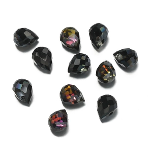 Macro shot of 6x7mm faceted teardrop crystal beads with iridescent AB coating for DIY