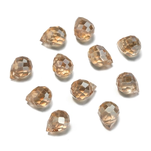 Macro detail of amber faceted teardrop glass beads for DIY jewelry making