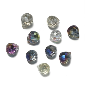 Close-up of faceted teardrop glass beads in various colors for DIY jewelry making