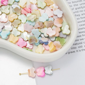 Macro detail of colorful butterfly shell beads for DIY jewelry with natural pearlescent finish
