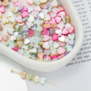 Colorful heart-shaped shell beads in assorted macaron colors for DIY jewelry making