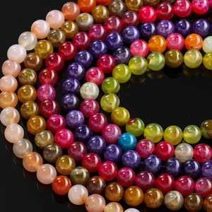 Macro shot of colorful dragon vein agate beads with crackle texture for jewelry DIY