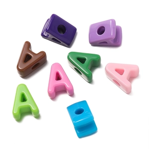 Close-up of colorful acrylic large hole alphabet beads for DIY jewelry making