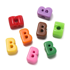 Macro view of colorful acrylic letter B beads for DIY jewelry and bracelet making