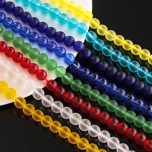Macro detail of various colorful 6-10mm textured glass beads for DIY jewelry making
