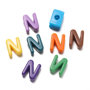 Detailed view of colorful acrylic letter N beads with large holes for DIY jewelry