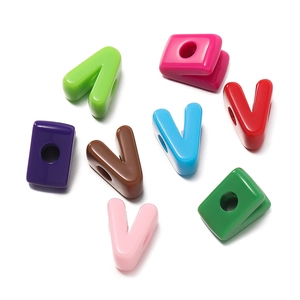 Close-up of colorful acrylic large hole alphabet beads for DIY jewelry and bracelet making