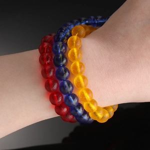 Three-piece frosted glass bead bracelet set in red, blue, and amber yellow for DIY jewelry