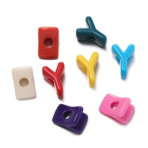 Macro shot of colorful large hole acrylic letter beads for DIY jewelry making sets
