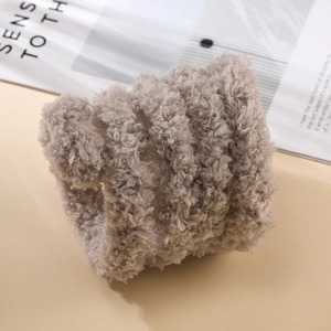 Detailed texture of thick 2cm coffee brown plush twisted stick for DIY craft projects
