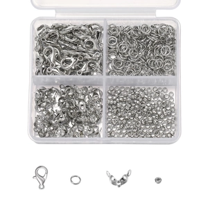 Silver jewelry making kit with lobster clasps and jump rings in a four-grid storage box