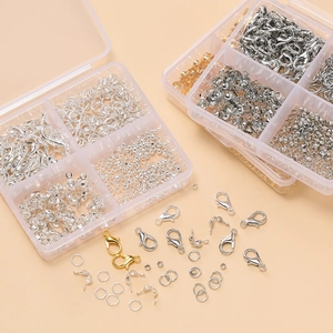 DIY jewelry making kit with lobster clasps and jump rings in a plastic organizer box