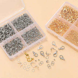 Comprehensive jewelry making kit with gold and silver lobster clasps and jump rings in a box