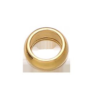 Macro shot of gold-colored stainless steel cylindrical beads for DIY jewelry making