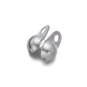Macro shot of silver stainless steel fold-over crimp bead connectors for DIY jewelry making