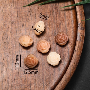 Detailed rose-shaped resin beads for jewelry making in various earthy tones, 12mm size