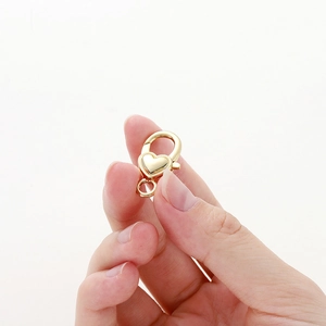 Macro di chiusura a moschettone a cuore placcato oro 18k per creazione gioielli fai da te