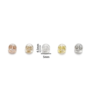 Detail of 5mm silicone and metal earring backs in rose gold, gold and silver finishes