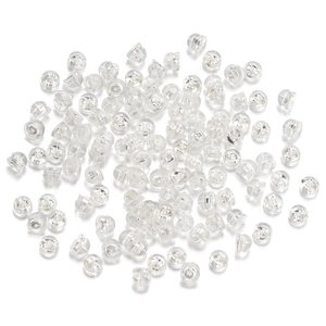 Macro shot of bulk transparent silicone bullet earring backs for jewelry making supplies