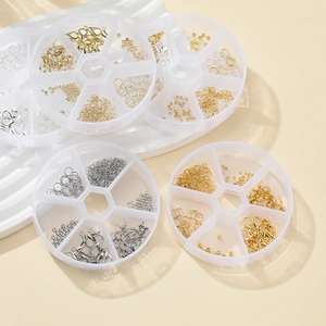 DIY jewelry making kit with lobster clasps and jump rings in plastic storage boxes