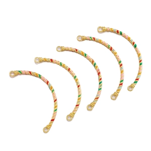 Detailed view of colorful enamel curved tube connectors for DIY bracelet jewelry making