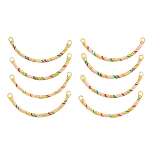 Macro view of colorful spiral enamel curved tube connectors for DIY bracelet jewelry
