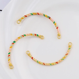Macro detail of colorful enamel cloisonné curved tube connectors for DIY bracelet jewelry