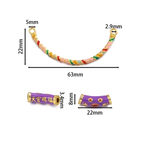 Detail of DIY jewelry parts with 63mm enamel curved tube and purple bead with blessings