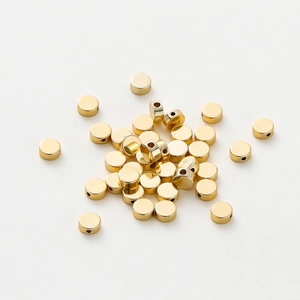 Flat round 18K gold-plated spacer beads with side holes for DIY jewelry making
